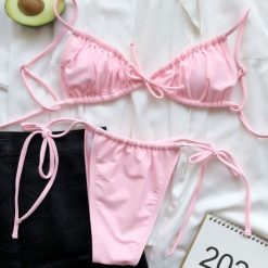 Bikini wiązane na plażę i do pływania Kamillah. Czarne bikini Intica, bez wzorów, z materiału. Za 119.00 zł.