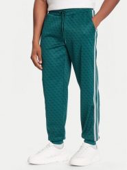 Guess Spodnie dresowe Z5BB19 K2042 Zielony Regular Fit. Zielone spodnie sportowe męskie Guess, m, z aplikacjami, z dresówki. Za 529.99 zł.