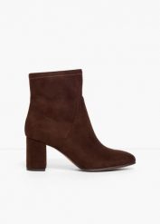 Krótkie botki marki Marco Tozzi z elastyczną cholewką. Brązowe botki damskie bonprix, bez wzorów, bez obcasa, bez zapięcia. Za 249.99 zł.