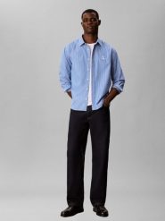 Calvin Klein Jeans koszula codzienna Mężczyźni Comfort Fit Bawełna (100%) niebieski, M. Niebieskie koszule męskie Calvin Klein Jeans, na lato, m, bez wzorów, z bawełny, eleganckie, bez kołnierzyka, bez ramiączek. Za 409.95 zł.