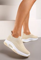 Beżowe Wsuwane Buty Sportowe na Koturnie z Perforacją Mellarina. Brązowe obuwie sportowe damskie Born2be, bez wzorów, bez zapięcia. Za 49.99 zł.