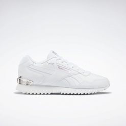 Trampki Damskie Drobne Fale Glide. Białe trampki i tenisówki damskie Reebok, bez wzorów, z gumy, bez zapięcia. Za 244.30 zł.