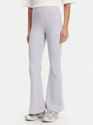 Puma Legginsy Dare To 629809 Fioletowy Slim Fit. Fioletowe legginsy damskie Puma, bez wzorów, z bawełny. Za 159.99 zł.