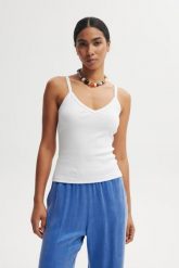 TOP CAMI BIAŁY M - Flawless. Białe topy damskie Flawless, m, bez wzorów, z bawełny, klasyczne, bez kołnierzyka, bez ramiączek. Za 179.00 zł.