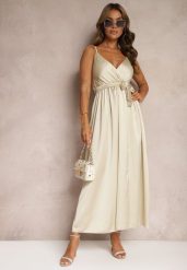 Beżowa Sukienka Wieczorowa o Rozkloszowanym Kroju z Gumką w Pasie i Rozcięciem Relsea. Brązowe sukienki damskie Renee, na imprezę, bez wzorów, eleganckie, bez kołnierzyka, bez ramiączek, maxi, rozkloszowane. Za 54.99 zł.