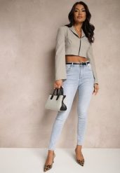 Niebieskie Jeansy o Kroju Slim High Waist Zdobione Haftem w Kształcie Serca Araniah. Niebieskie jeansy damskie Renee, na lato, z aplikacjami, z jeansu, eleganckie, z podwyższonym stanem. Za 79.99 zł.