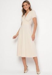 Jasnobeżowa Sukienka Rozkloszowana z Wiskozą z Poduszkami w Ramionach Awerla. Brązowe sukienki damskie Born2be, na co dzień, l, bez wzorów, z wiskozy, eleganckie, bez kołnierzyka, bez ramiączek, midi, rozkloszowane. Za 129.99 zł.