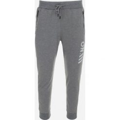 Ciemnoszare Spodnie Dresowe Teodosyne. Szare spodnie materiałowe męskie Born2be, l, bez wzorów, z dresówki. Za 54.99 zł.