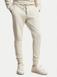 Polo Ralph Lauren Spodnie dresowe 710881518516 Kremowy Regular Fit. Białe spodnie sportowe męskie Polo Ralph Lauren, m, bez wzorów, z bawełny. Za 729.99 zł.