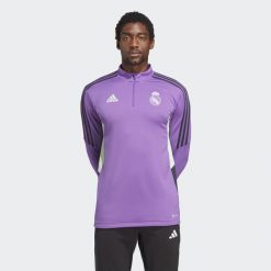 Bluza do piłki nożnej męska Adidas Real Madrid Condivo 22 Training Top. Fioletowe bluzy męskie Adidas, m, bez wzorów, z materiału, sportowe, bez ramiączek, bez kaptura. W wyprzedaży za 216.00 zł.
