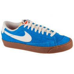 Buty sportowe do chodzenia damskie, W Blazer Low 77. Niebieskie obuwie sportowe damskie Nike, bez wzorów, bez zapięcia, trekkingowe. Za 349.99 zł.
