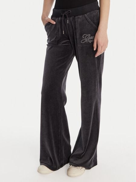 Guess Spodnie dresowe W6RB32 KCUF1 Granatowy Regular Fit. Niebieskie spodnie dresowe damskie Guess, z aplikacjami, z bawełny. Za 389.99 zł.