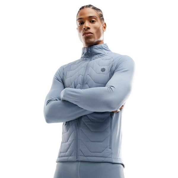 Męska lekka ocieplana kurtka treningowa Fitness Siroko Recharge. Niebieskie kurtki męskie SIROKO, na zimę, m, bez wzorów, z materiału, bez kaptura, do biegania. W wyprzedaży za 211.00 zł.