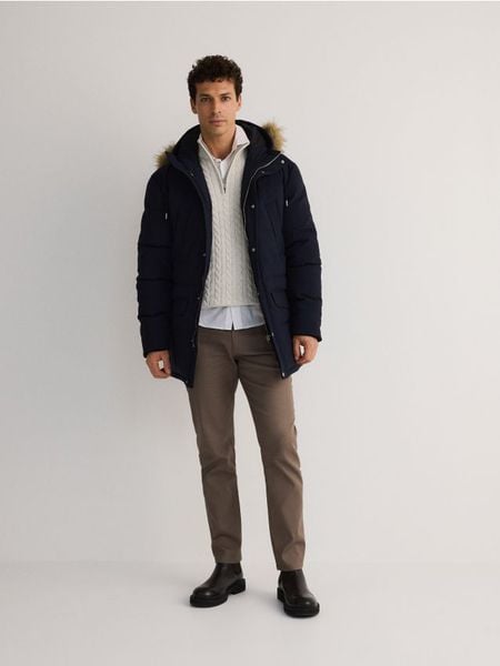 Pikowana kurtka z kapturem - granatowy. Niebieskie kurtki męskie Reserved, l, bez wzorów, z tkaniny, z kapturem. Za 299.99 zł.