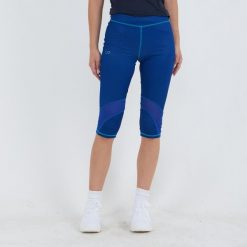 Legging 3/4 do treningu ASYR damskie. Niebieskie spodnie dresowe damskie ELPLAYER, bez wzorów, z dżerseju, sportowe. W wyprzedaży za 76.50 zł.