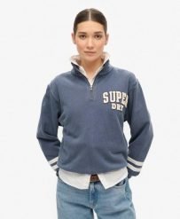Bluza sportowa z pół-zipem. Niebieskie bluzy damskie Superdry, l, bez wzorów, z bawełny, eleganckie, bez ramiączek, bez kaptura. Za 267.20 zł.