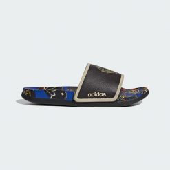 Klapki Adilette Komfort. Czarne klapki damskie Adidas, bez wzorów, sportowe, bez obcasa, bez zapięcia. W wyprzedaży za 123.38 zł.