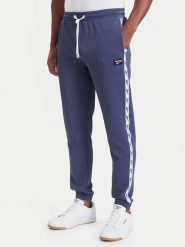 Reebok Spodnie dresowe Jacek RK25723CCM Granatowy Regular Fit. Niebieskie spodnie sportowe męskie Reebok, m, bez wzorów, z dresówki. Za 259.99 zł.