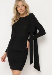 Czarna Dopasowana Brokatowa Sukienka z Wiskozą Ozdobiona Kokardą na Ramieniu liala. Czarne sukienki damskie Born2be, na co dzień, l, bez wzorów, z wiskozy, eleganckie, bez kołnierzyka, bez ramiączek, mini, dopasowane. Za 149.99 zł.