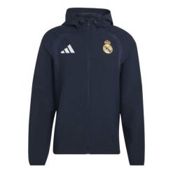 Kurtka przeciwwiatrowa z zamkiem Real Madrid Tiro 2026/27. Niebieskie kurtki męskie Adidas, l, bez wzorów, ze splotem, eleganckie, bez kaptura. Za 388.00 zł.