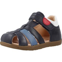 Sandały Geox Model B S.macchia B. Niebieskie sandały damskie Geox, bez wzorów, ze skóry, bez obcasa, bez zapięcia. Za 209.99 zł.
