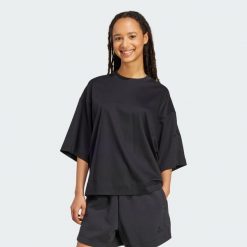 Luźna koszulka Soft Lux. Niebieskie bluzki damskie Adidas, xl, bez wzorów, sportowe, bez kołnierzyka, bez ramiączek. Za 199.00 zł.