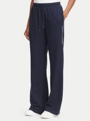 Tommy Hilfiger Spodnie dresowe UW0UW06620 Granatowy Regular Fit. Niebieskie spodnie dresowe damskie Tommy Hilfiger, bez wzorów, z bawełny. Za 289.99 zł.