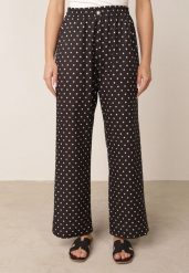 Czarne Spodnie Casual w Groszki z Szerokimi Nogawkami i Wysokim Stanem Soleano. Czarne spodnie materiałowe damskie Born2be, bez wzorów, z jeansu, casualowe, z podwyższonym stanem, plus size, długie. Za 59.99 zł.