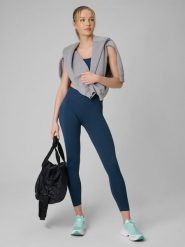 4F Legginsy treningowe bezszwowe damskie - turkusowe XS/S. Niebieskie legginsy damskie 4F, bez wzorów, ze skóry. Za 129.99 zł.