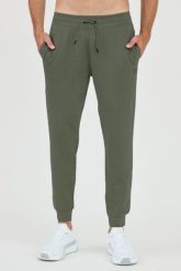 GUESS Zielone męskie spodnie dresowe Aldwin. Zielone spodnie sportowe męskie Guess, m, z aplikacjami, z bawełny. W wyprzedaży za 250.99 zł.