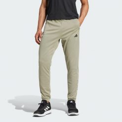 Spodnie Train Essentials Camo Training. Szare spodnie sportowe męskie Adidas, xs, bez wzorów, z dzianiny, na fitness i siłownię. Za 299.00 zł.