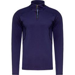 Golf DESCENTE RYAN. Niebieskie swetry męskie Descente, bez wzorów, sportowe, bez kołnierzyka, bez ramiączek. W wyprzedaży za 440.00 zł.