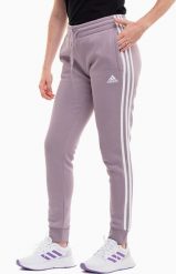 Adidas Spodnie damskie adidas Essentials 3-Stripes Fleece fioletowe IR5403 XS. Fioletowe spodnie dresowe damskie Adidas, bez wzorów, sportowe. Za 196.08 zł.