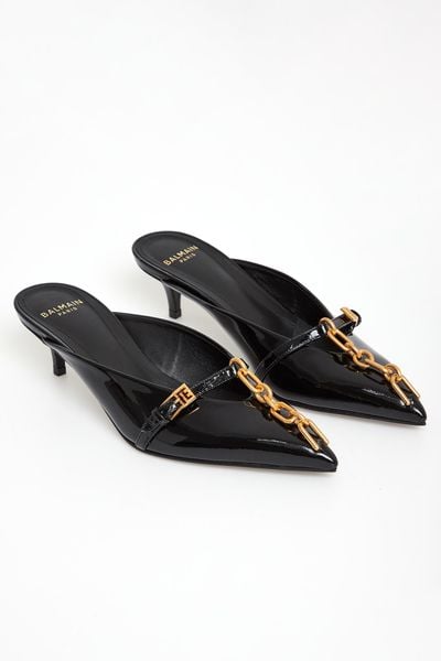 Klapki mule na obcasie Sync BALMAIN. Klapki damskie Balmain, bez wzorów, bez obcasa, na obcasie, bez zapięcia. Za 4,029.00 zł.