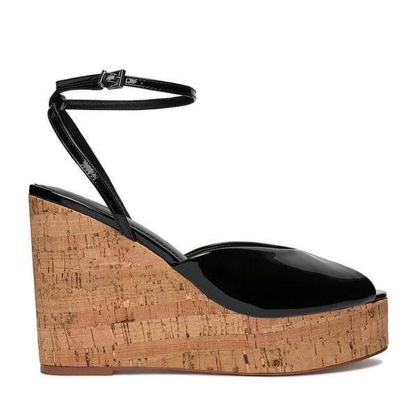 Sandały Badura. Czarne sandały damskie Badura, bez wzorów, bez obcasa, na koturnie, bez zapięcia. Za 138.99 zł.