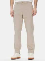 Calvin Klein Jeans Chinosy LV040EM628 Beżowy Slim Fit. Brązowe eleganckie spodnie męskie Calvin Klein Jeans, bez wzorów, z bawełny. Za 339.99 zł.