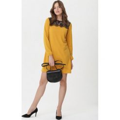 Żółta Sukienka Doreen. Żółte sukienki damskie Born2be, l, bez wzorów, z koronki, eleganckie, bez kołnierzyka, bez ramiączek, mini. Za 69.99 zł.