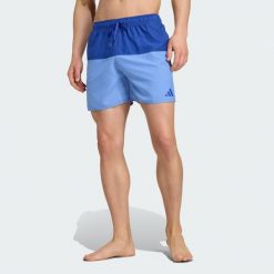 Szorty kąpielowe Colorblock 5 Inch. Niebieskie kąpielówki męskie Adidas, bez wzorów, z tkaniny. Za 149.00 zł.