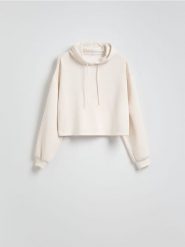 Krótka bluza z kapturem - złamana biel. Bluzy damskie Reserved, l, bez wzorów, z dzianiny, bez ramiączek, z kapturem. Za 89.99 zł.