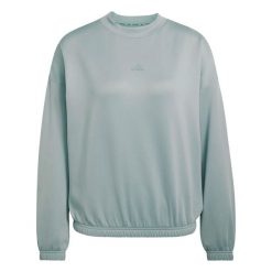 Bluza damska adidas Motion Essentials. Zielone bluzy damskie Adidas, l, bez wzorów, z materiału, bez ramiączek, bez kaptura. Za 220.00 zł.
