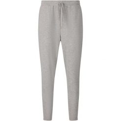 Damskie spodnie dresowe Athlecia Jacey V2. Fioletowe spodnie dresowe damskie Athlecia, bez wzorów, z dresówki, sportowe. Za 246.00 zł.