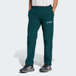 Spodnie Terrex Multi Liteflex. Brązowe spodnie sportowe damskie Adidas, bez wzorów, z materiału, sportowe, trekkingowe. W wyprzedaży za 279.30 zł.
