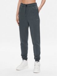 Calvin Klein Performance Spodnie dresowe 00GWS3P605 Zielony Regular Fit. Zielone spodnie dresowe damskie Calvin Klein Performance, bez wzorów, z bawełny. Za 329.99 zł.