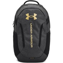 Plecak Under Armour Hustle. Czarne plecaki męskie Under Armour, bez wzorów, z materiału, eleganckie. Za 276.50 zł.