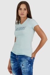 GUESS Błękitny t-shirt damski z metalicznym logo i cyrkoniami. Niebieskie t-shirty damskie Guess, s, z aplikacjami, z bawełny, bez kołnierzyka, bez ramiączek. W wyprzedaży za 129.99 zł.