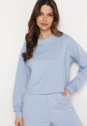 Jasnoniebieska Bawełniana Bluza Oversize o Krótszym Kroju Vesperana. Niebieskie bluzy damskie Born2be, l, bez wzorów, z bawełny, casualowe, bez ramiączek, bez kaptura. Za 99.99 zł.