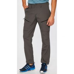Salewa - Spodnie. Brązowe spodnie materiałowe męskie Salewa, bez wzorów, z materiału. W wyprzedaży za 179.90 zł.