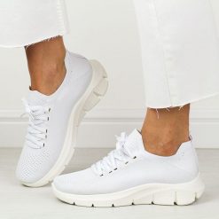 Białe sportowe buty damskie Potocki 01303. Białe obuwie sportowe damskie POTOCKI, na lato, bez wzorów, z tkaniny, bez zapięcia, na fitness i siłownię. Za 69.00 zł.