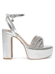 Nine West Sandały WFA2736-1 Srebrny. Szare sandały damskie Nine West, bez wzorów, z syntetyku, bez obcasa, na słupku, bez zapięcia. Za 155.99 zł.