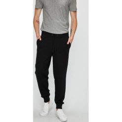Calvin Klein Jeans - Spodnie. Szare spodnie materiałowe męskie Calvin Klein Jeans, bez wzorów, z bawełny. W wyprzedaży za 219.90 zł.